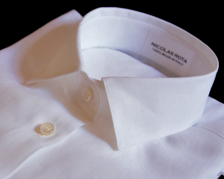 Handcrafted white women's shirt in fine soft linen and Australian mother of pearl buttons. Handmade in Italy.