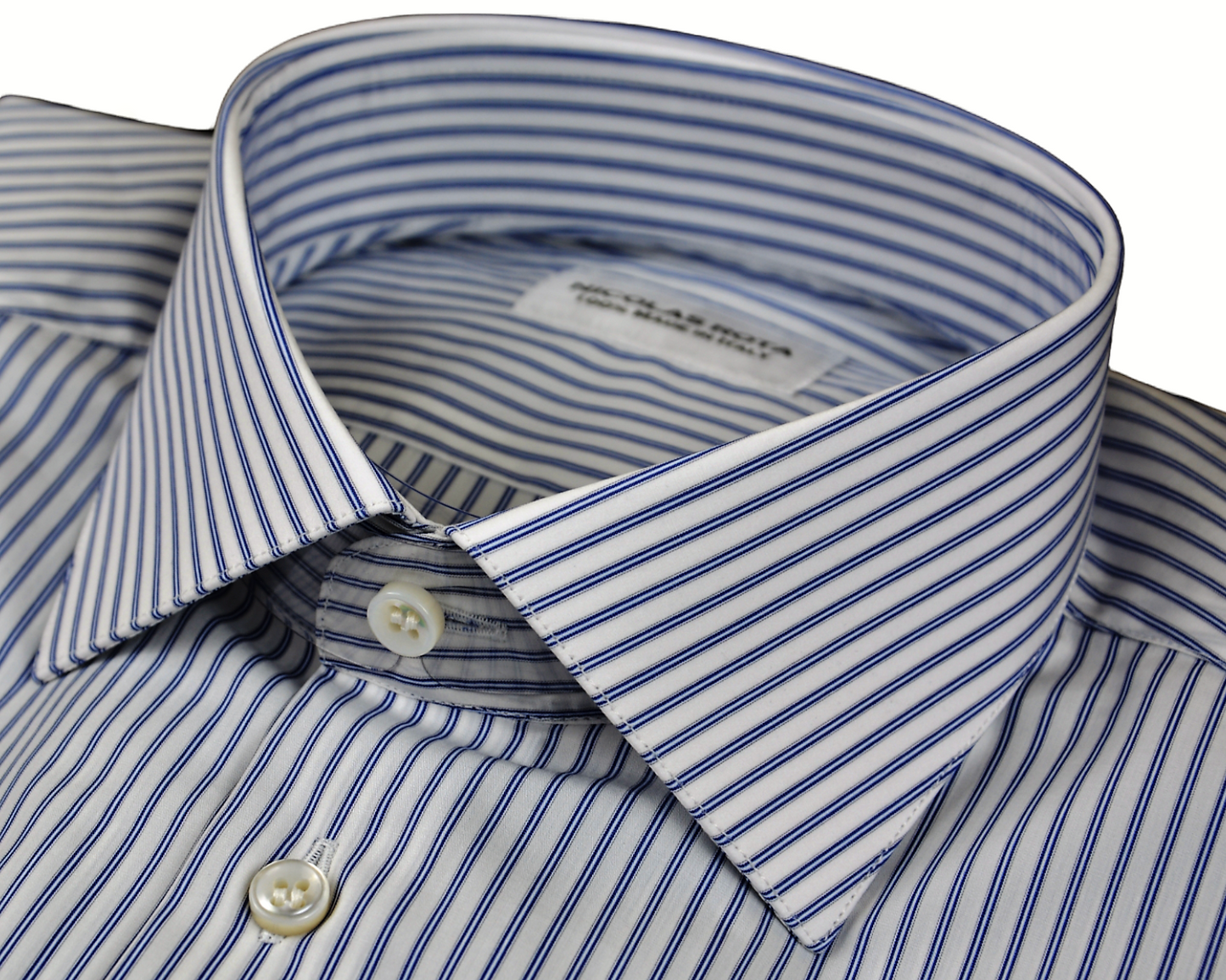 Rome handcrafted white men's shirt with blue stripes in fine soft poplin cotton and Autralian mother of pearl buttons.
Handmade in Italy.